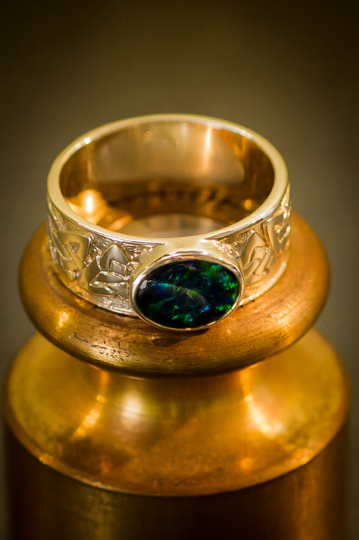 gold & opal celtic ring