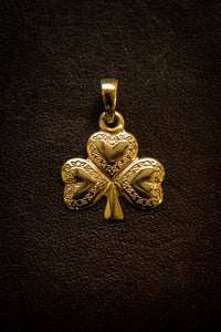 Gold shamrock pendant