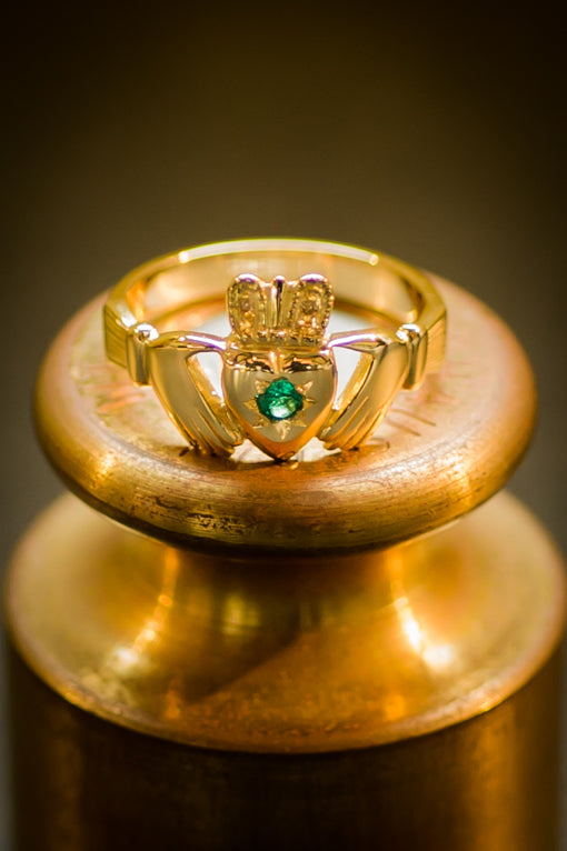 womens claddagh ring with star set emerald